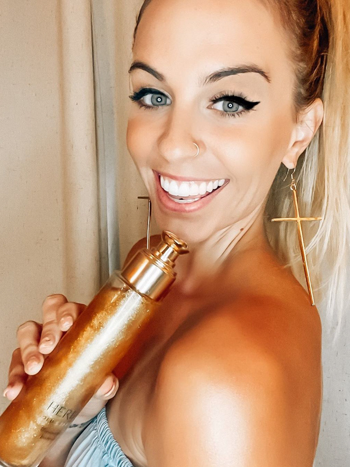 illuminating body oil with 24k gold