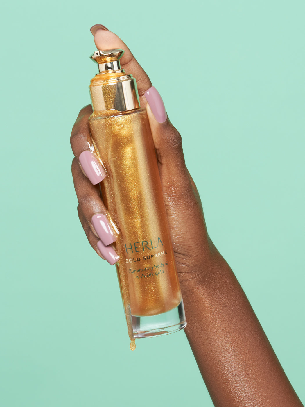 illuminating body oil with 24k gold