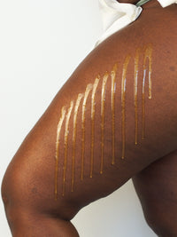 illuminating body oil with 24k gold thumbnail